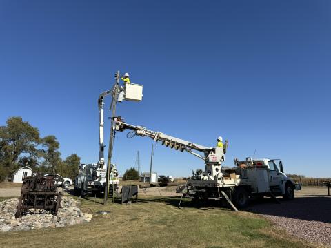 Line Crew Removing Pole